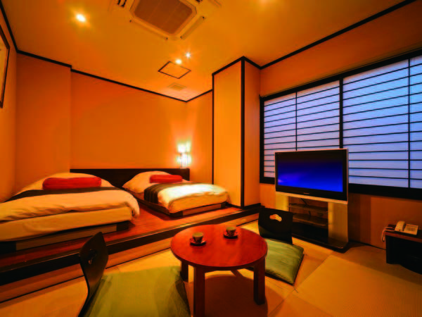 【和モダン客室/例】和室8畳のお部屋にベッドを2台設置。1階なので館内移動もラクラク
