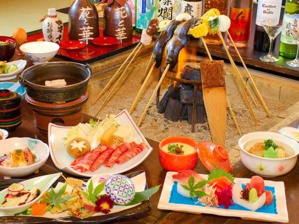 炭火で炙った旬の食材と当館自家製寒仕込み「平家山盛味噌」で織りなす伝統の「平家お狩場焼」が主役の会席料理。ここでしか味わえない特別な囲炉裏を囲む会席料理（例）