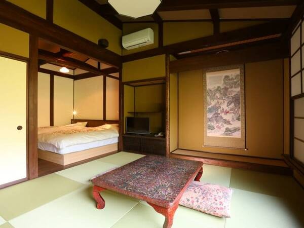 川胡桃の間一例/山桜の間　畳とベッドの和洋室１２畳　展望風呂が付いているお部屋です。