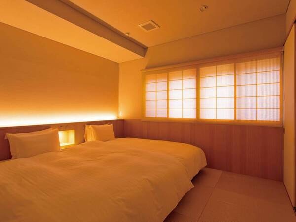 【じぞう・ふどうの間/一例】寝室にはセミダブルサイズのベッドを2台設置
