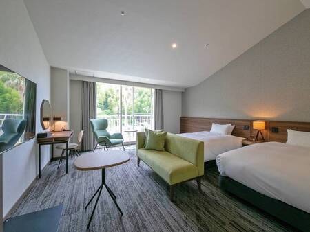 【デラックスツイン/例】ゆったり42㎡にセミダブルベッド2台を配置したお部屋