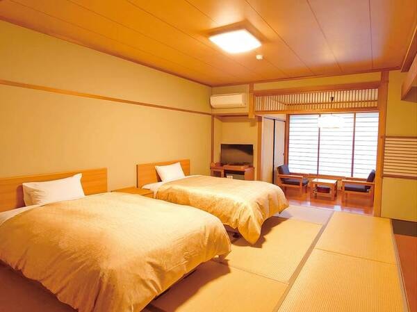 低層階ツインベッド和室/例