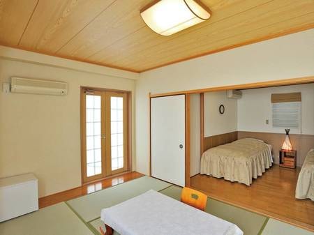 【山側眺望・露天風呂付和洋室/例】ベッドを2台備えたお部屋。温泉露天風呂付き！