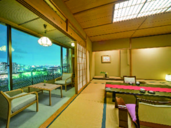 【客室/例】広々とした12.5畳和室(54㎡)。夜景の煌めきの中、清流の武庫川を望む