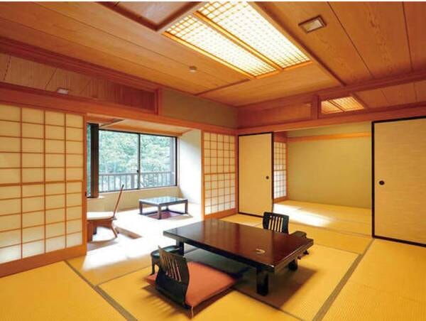【続き間の広々とした客室/例】グループやご家族での利用に好評です。