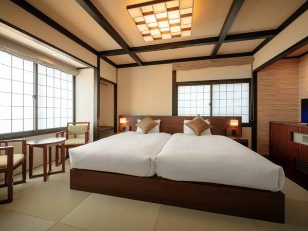 【和風ハリウッドツイン】床には琉球畳を使用しており、落ち着いた空間の和室にシモンズ社製のベッドをご用意