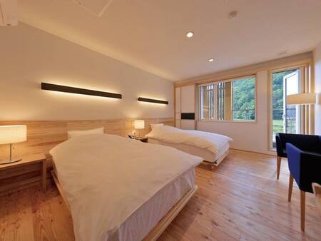 A-TYPE 洋室ツイン：無垢材をふんだんに使用したシンプルデザインのお部屋