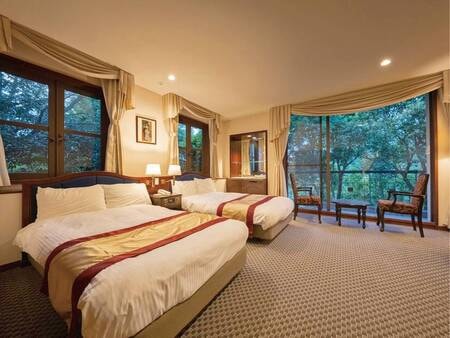 【VILLA棟◆和洋室】広々とした空間の大きな窓からは伊豆の自然を感じることができます。/一例