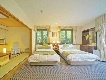 【VILLA棟◆和洋室】広々とした空間の大きな窓からは伊豆の自然を感じることができます。/一例